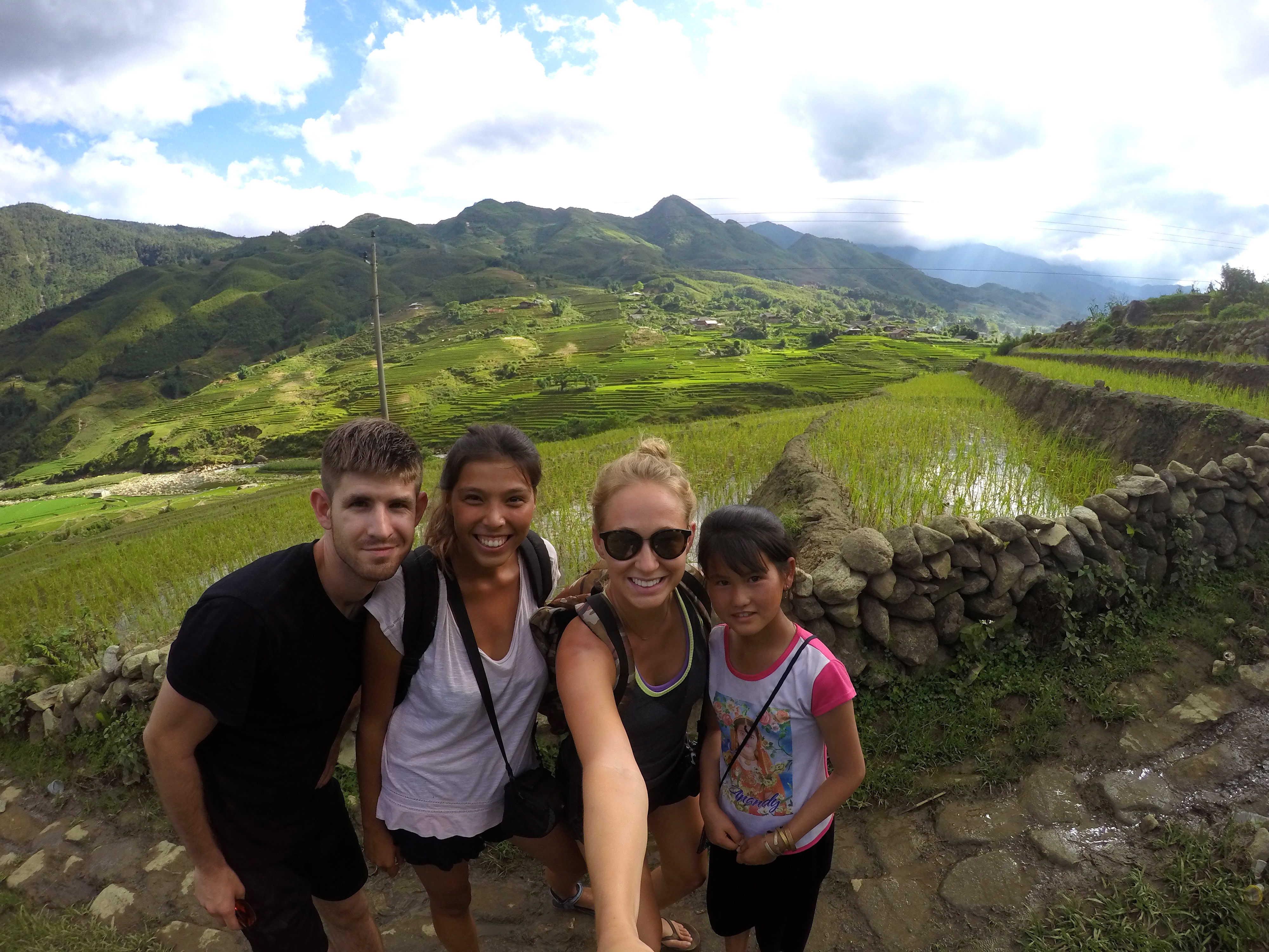 Josh, Vic, Me, and Ku's sister walking through the rice terraces.