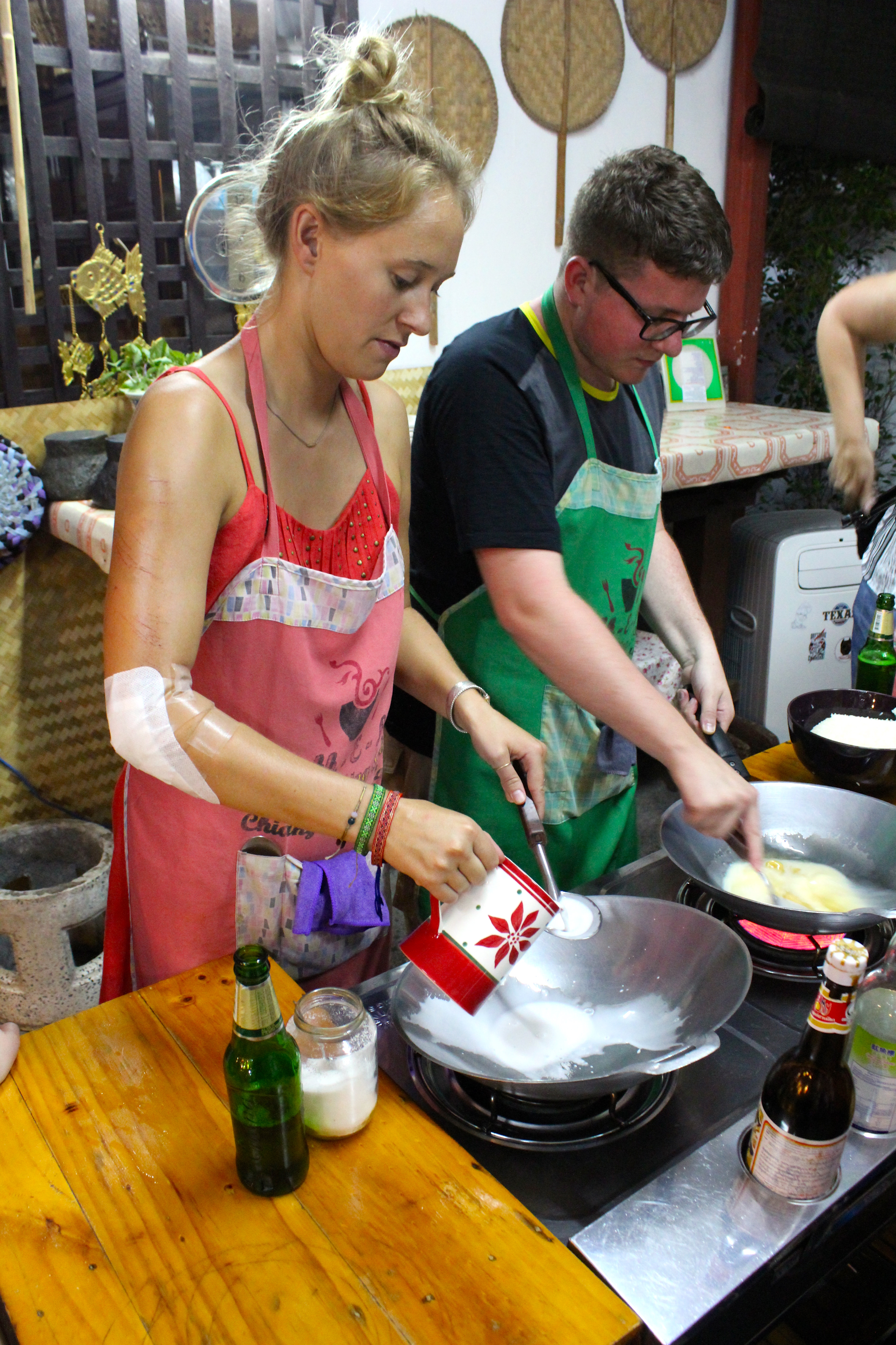 Learning how to make Coconut Soup at Zabb E Lee Cooking School.