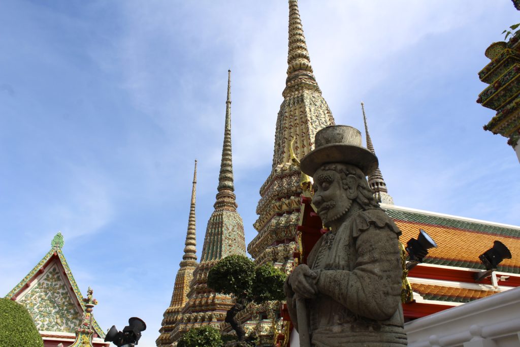 Ornate sculptures & temples of Wat Pho in Bangkok.