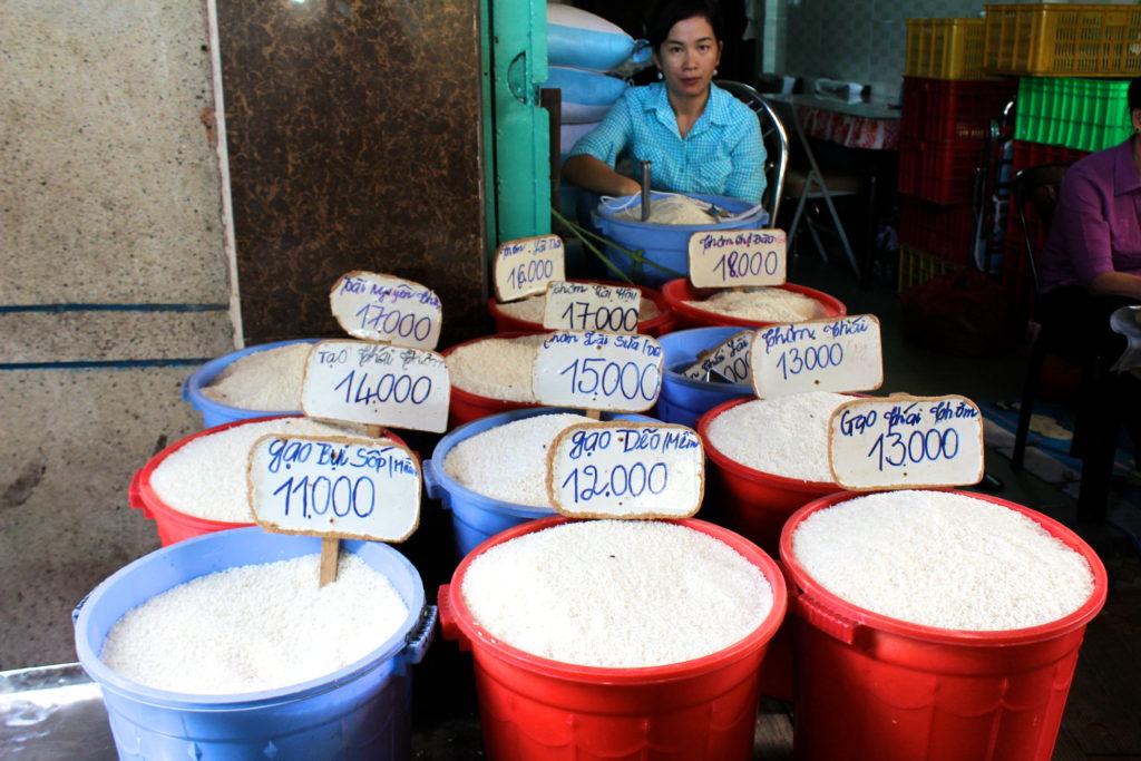 A woman selling rice at a market I stumbled upon off of Nguyen Tri Phuong in District 10.