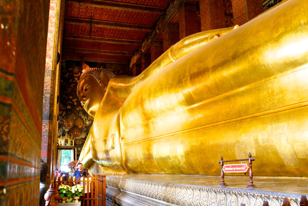 The Reclining Buddha of Wat Pho, measuring 150 feet long!