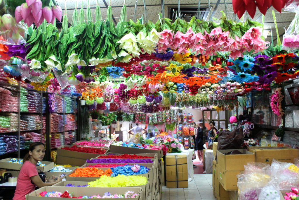 A faux flower shop along the narrow Sempang Lane Market.