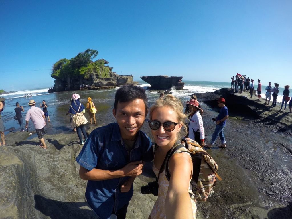 My Uber driver, Abdul, posing for a photo with me at Tanah Lot!