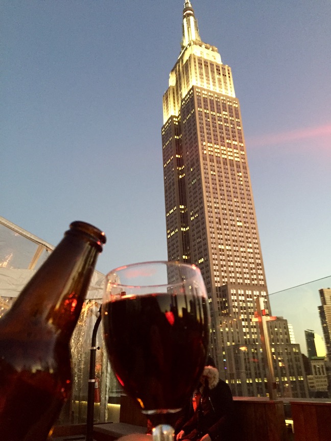 Cheers to a phenomenal view of the Empire State Building at Monarch Rooftop!
