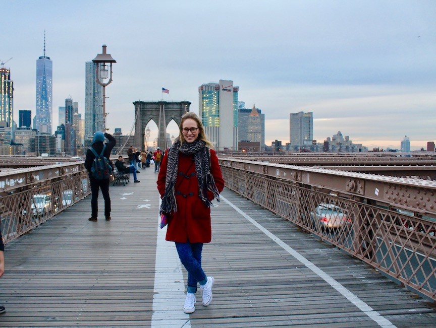 Cheesin' on the Brooklyn Bridge with Manhattan behind me.