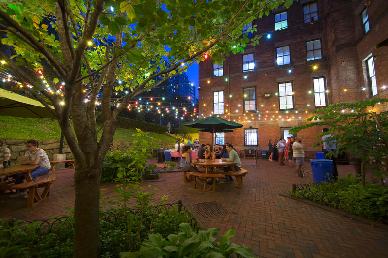 HI NYC Hostel has an awesome back patio where you can socialize with other travelers. (Photo cred: Hostelworld.com)