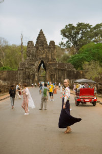 Siem Reap, Angkor Wat, What to do in Siem Reap, Siem Reap Guide, Cambodia, Best Photos of Angkor Wat, Wanderluluu, girl twirling Angkor Wat, Angkor Wat Photo Inspiration